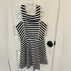 Cutest dress size 11/12 for kids. Only worn once. Bought from posh boutique.